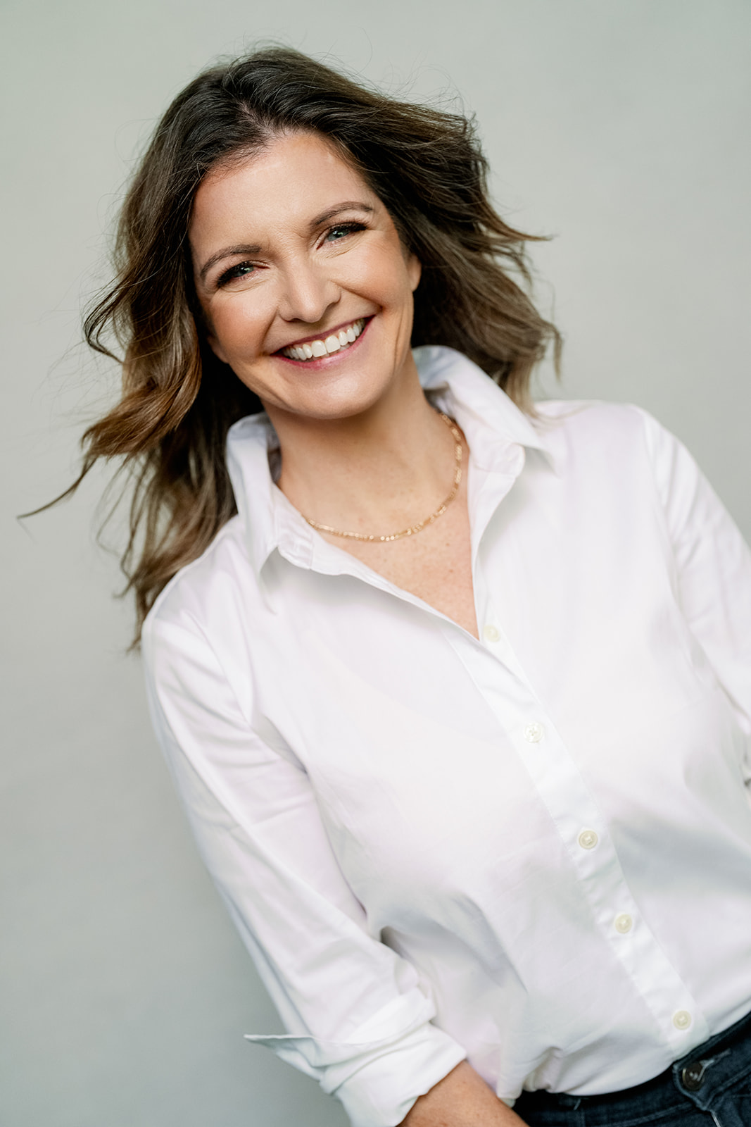 Tammy Jo smiling in a white shirt